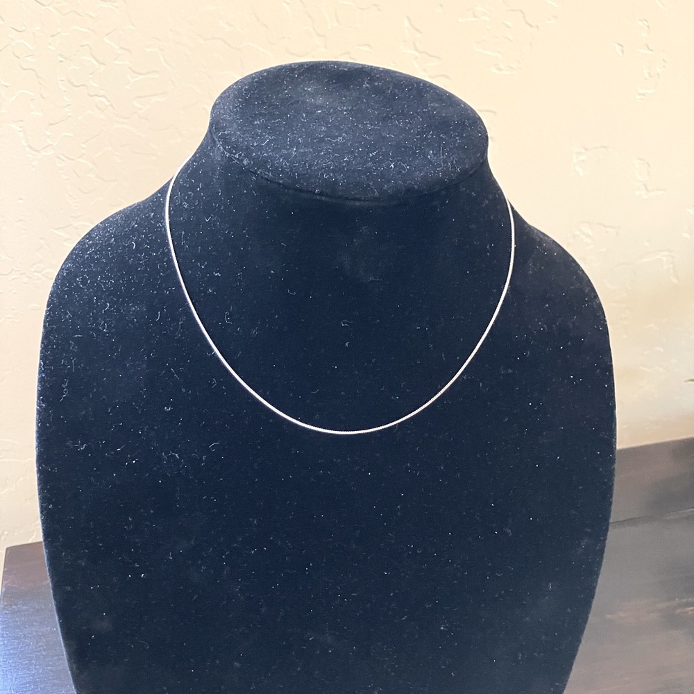 Sterling Silver 15” Choker Necklace. Very dainty chain. Weighs one gram.